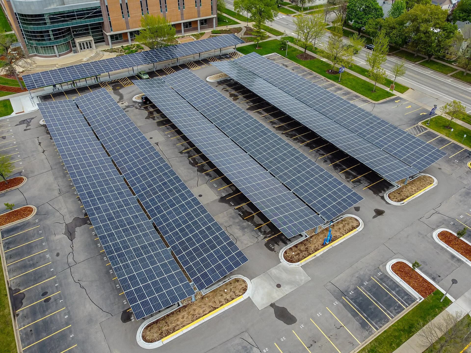 Solar panel canopy over a commercial parking area